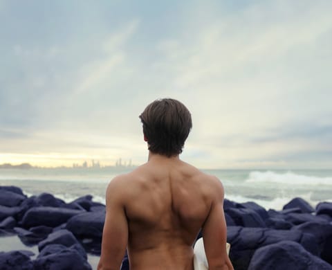 The man is watching on the sea